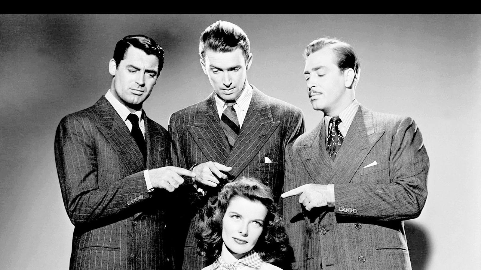 Katharine Hepburn con el reparto masculino de «Historias de Filadelfia», entre los que destaca su compañero de éxitos Cary Grant